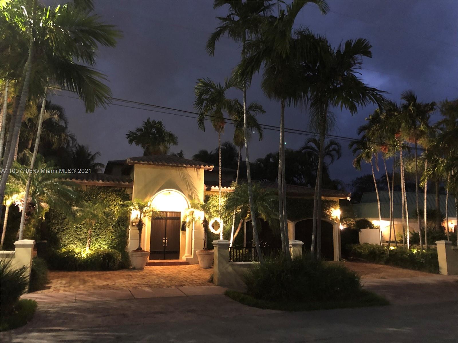 1385 North Biscayne Point Road Miami Beach, FL 33141 - Photo 3 of 68 a view of a house with a yard and tree s