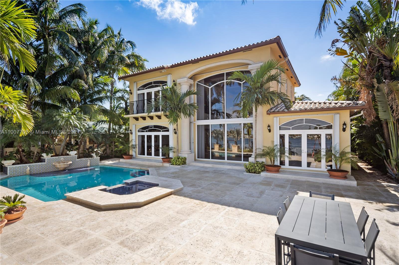 1385 North Biscayne Point Road Miami Beach, FL 33141 - Photo 34 of 68 a front view of a house with yard and green space