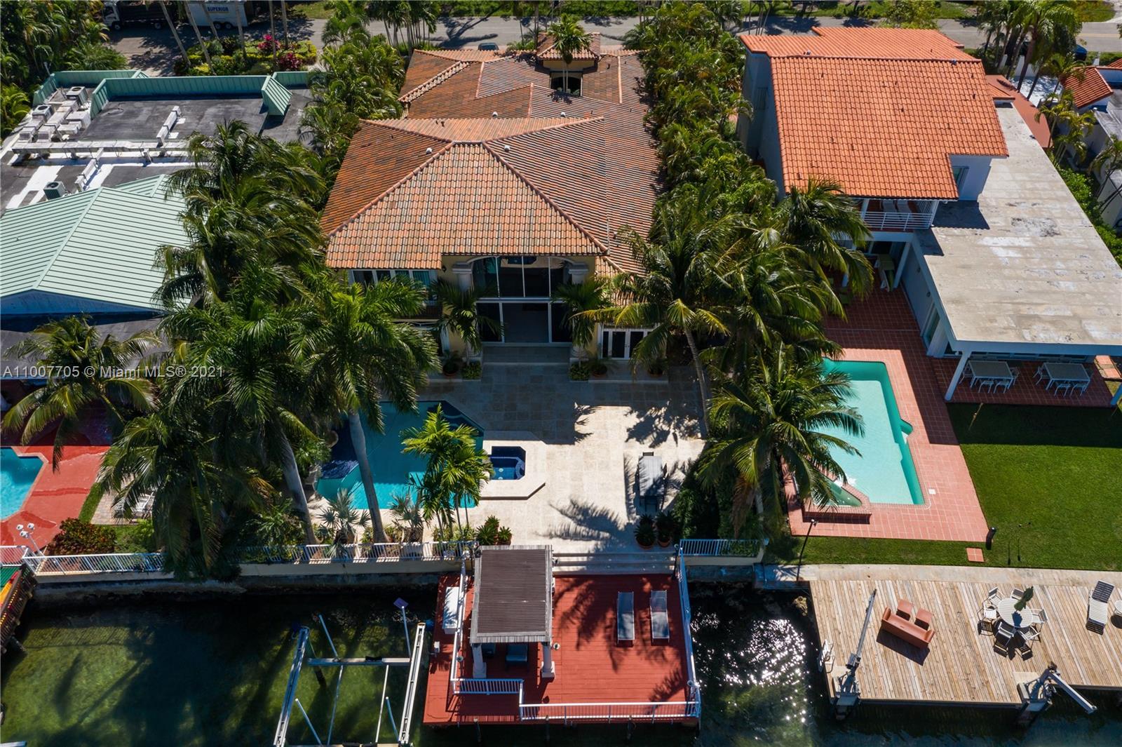 1385 North Biscayne Point Road Miami Beach, FL 33141 - Photo 41 of 68 an aerial view of a house with table and chairs