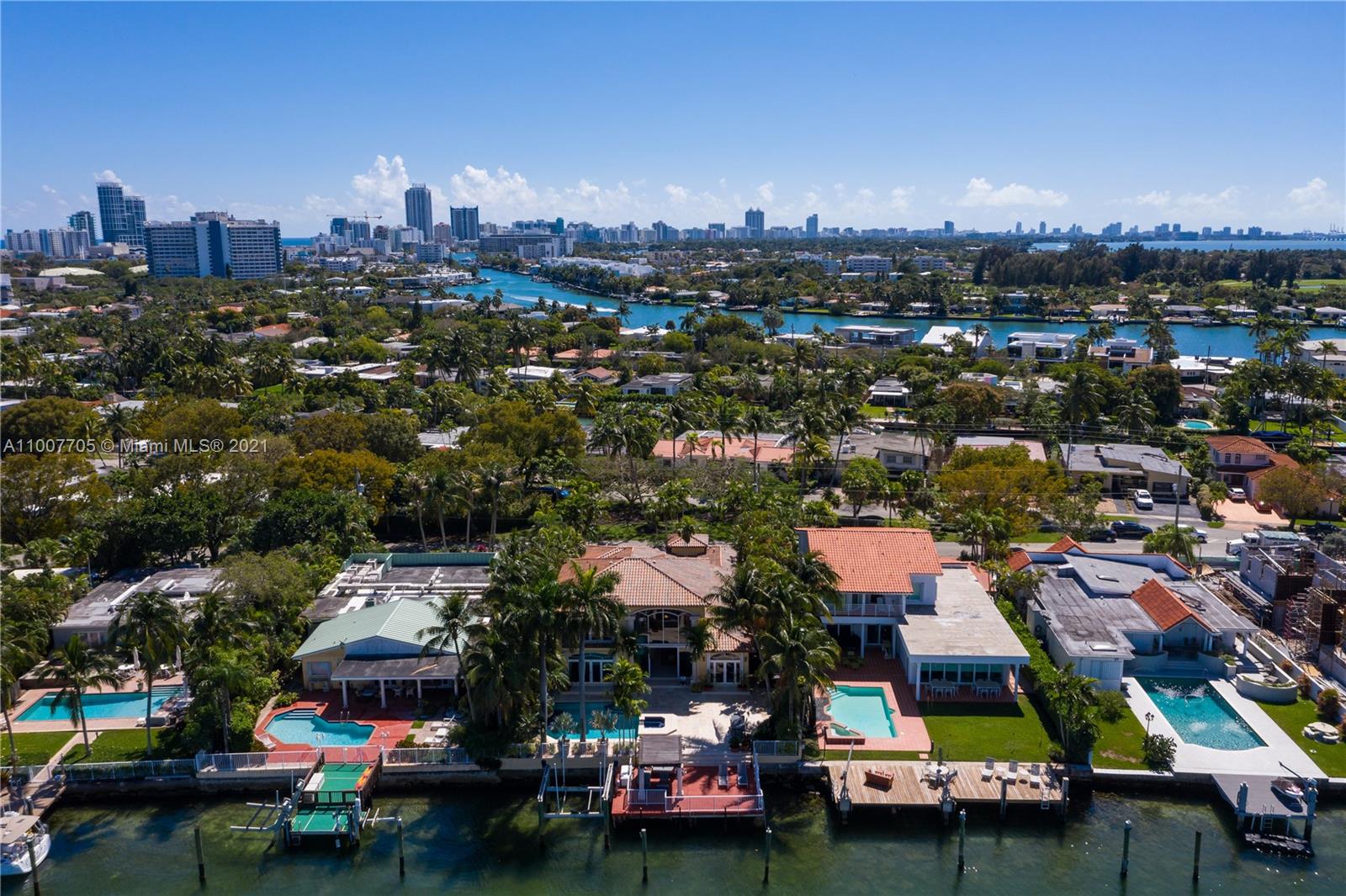 1385 North Biscayne Point Road Miami Beach, FL 33141 - Photo 44 of 68 an aerial view of a city with lots of residential buildings ocean and mountain view in back