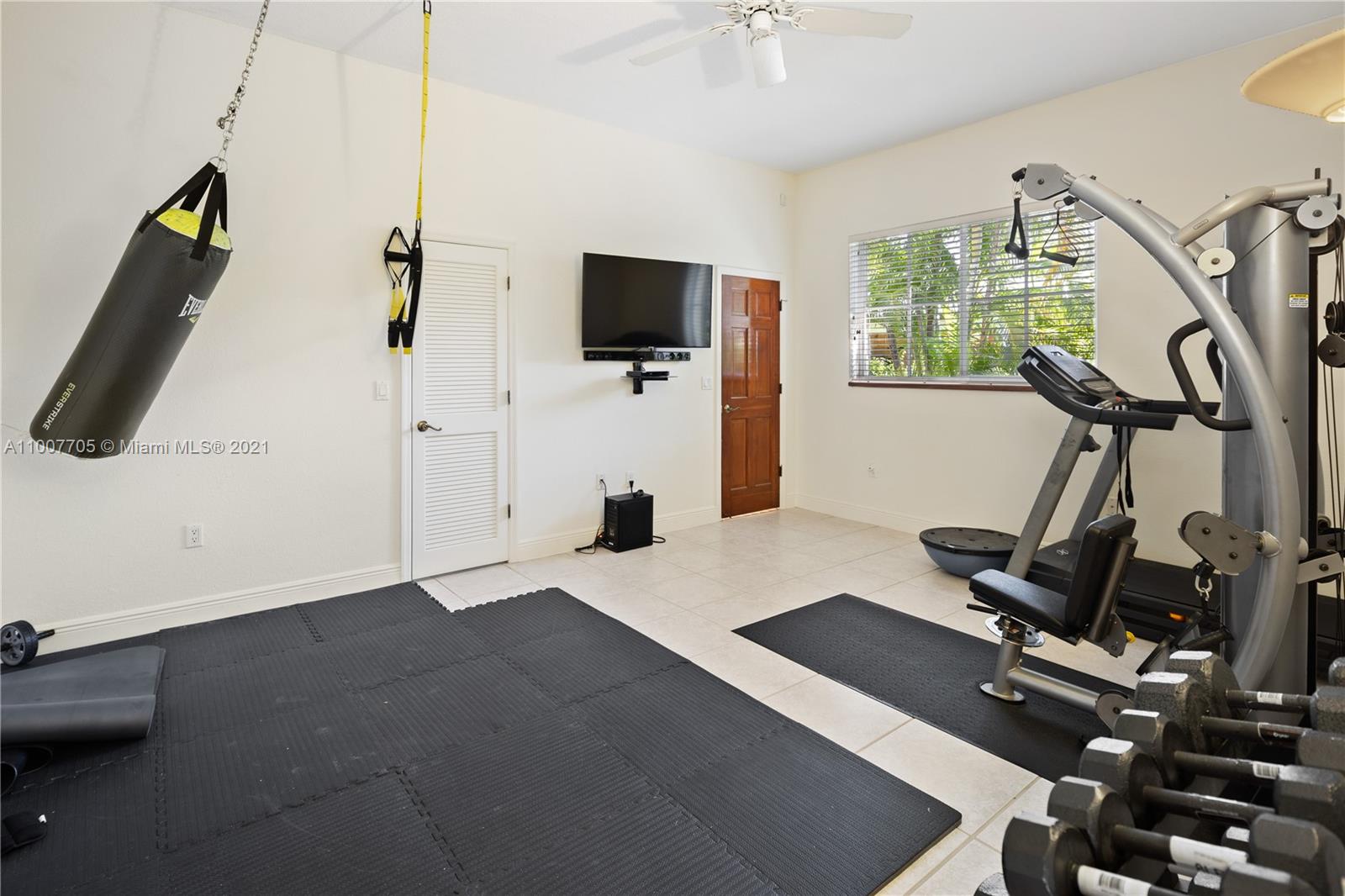 1385 North Biscayne Point Road Miami Beach, FL 33141 - Photo 51 of 68 a view of a room with gym equipment