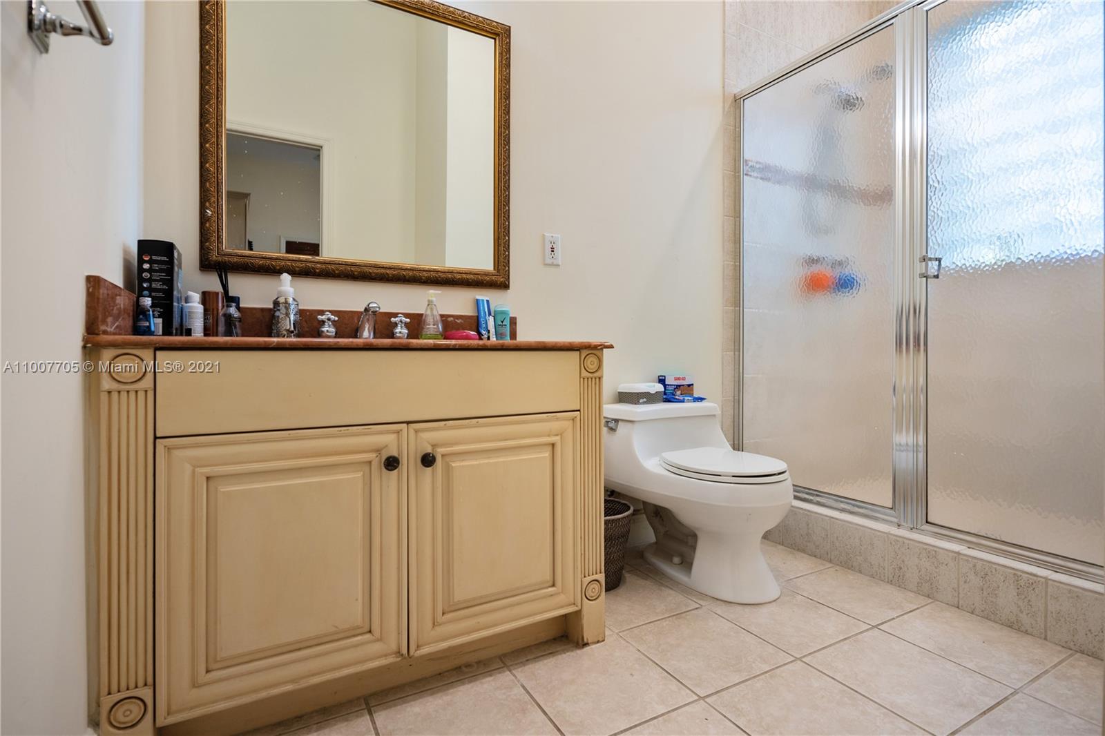 1385 North Biscayne Point Road Miami Beach, FL 33141 - Photo 58 of 68 a bathroom with a sink a toilet and shower