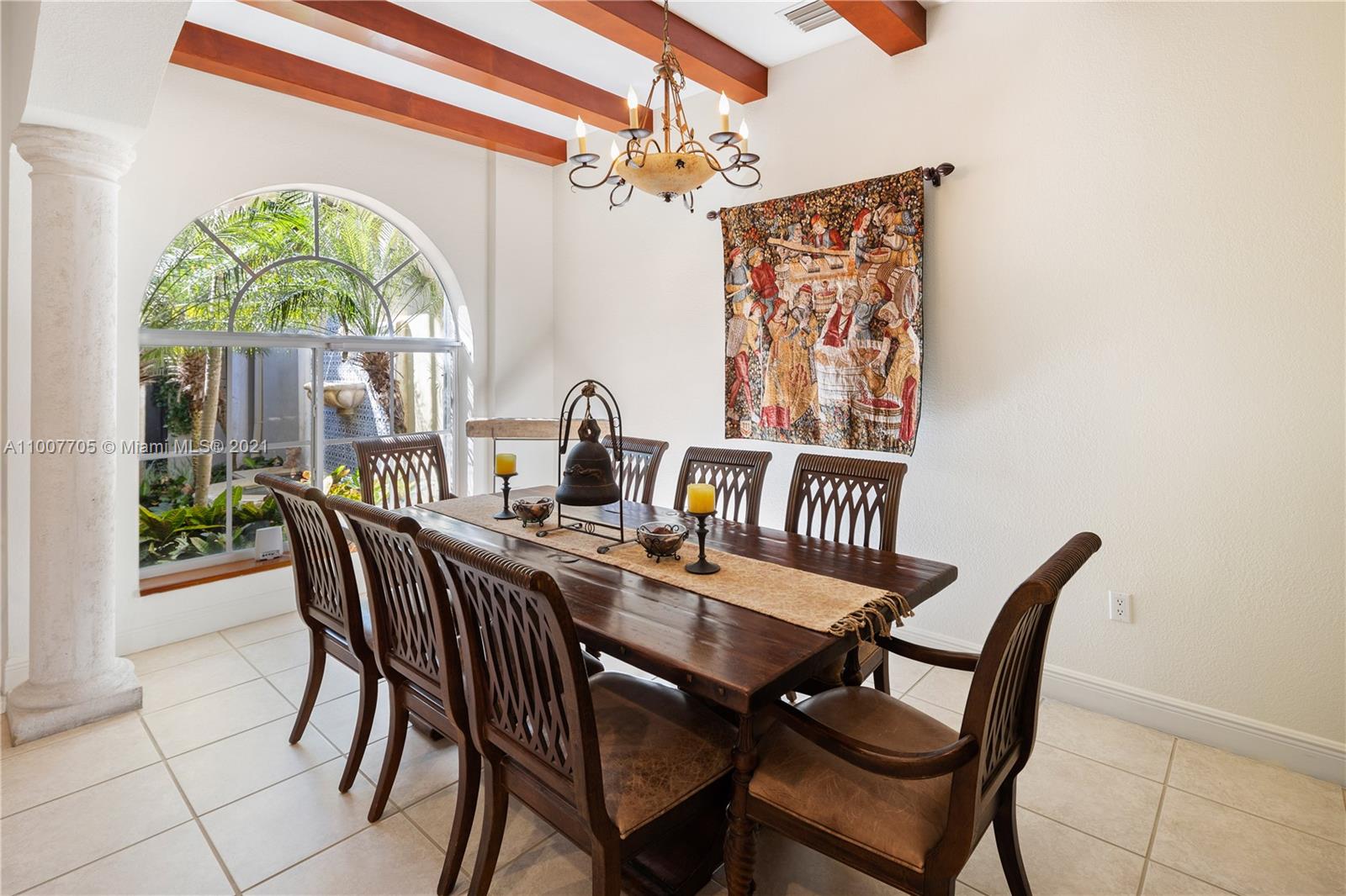 1385 North Biscayne Point Road Miami Beach, FL 33141 - Photo 9 of 68 a view of a dining room with furniture a chandelier and a window