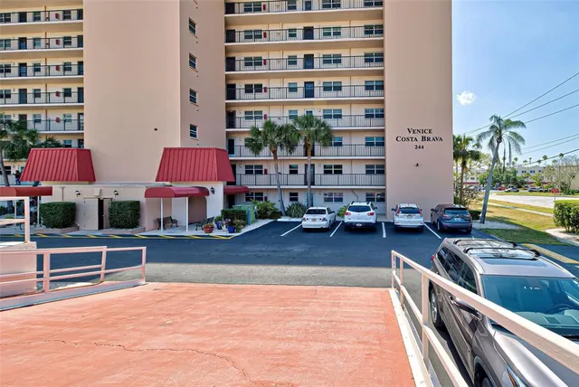 a view of swimming pool from a balcony