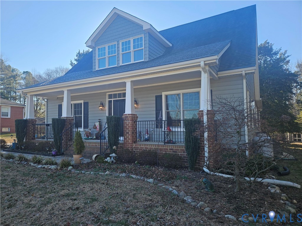 11503 Ashcake Road Ashland, VA 23005 - Photo 2 of 7 a view of a house with a yard and large tree