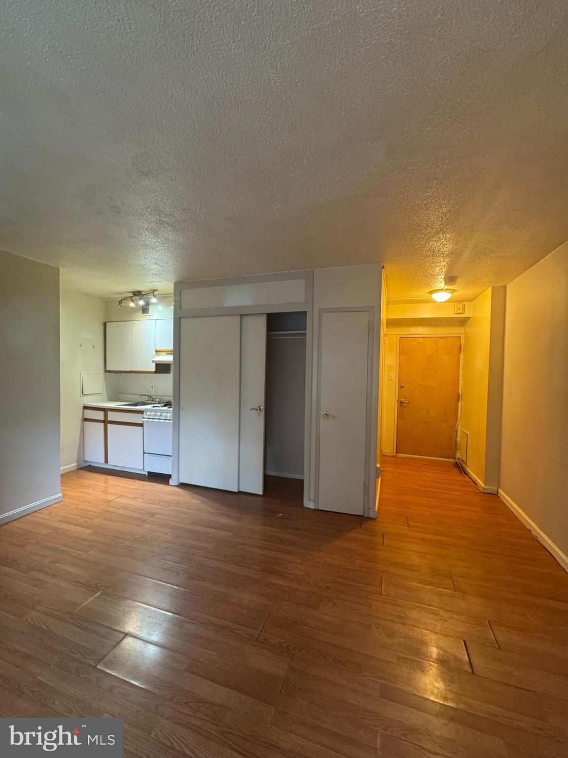 2101 Chestnut Street, Unit 216 Philadelphia, PA 19103 - Photo 6 of 8 a view of empty room with wooden floor