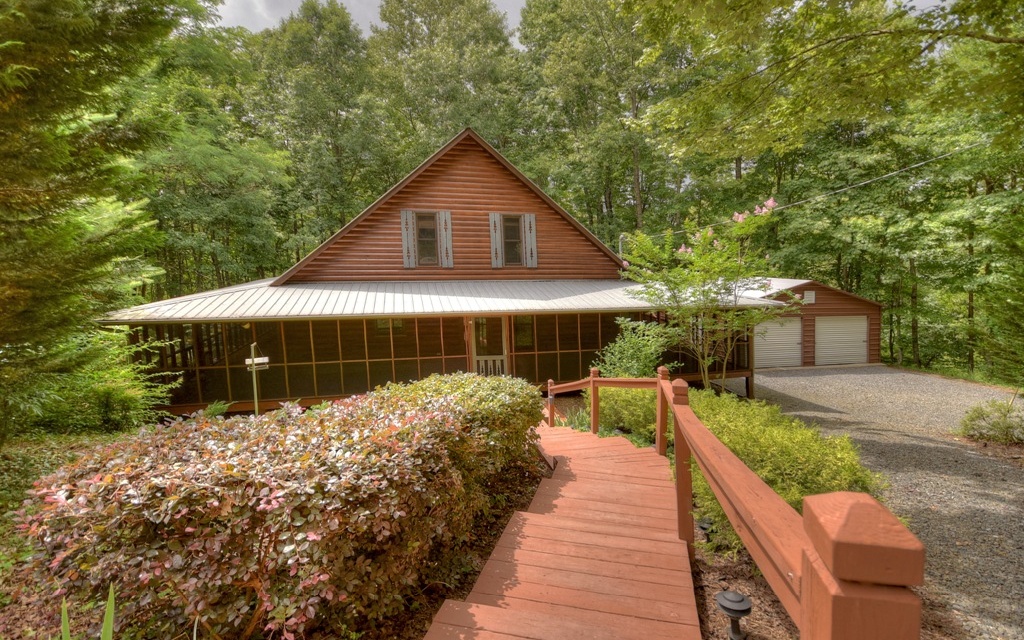3482 Aska Road Blue Ridge, GA 30513 - Photo 1 of 1 a front view of house with yard and green space