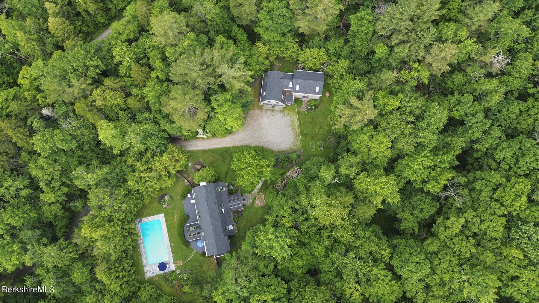 130 Woodmere Road Becket, MA 01223 - Photo 2 of 50 an aerial view of a house with a yard and trees