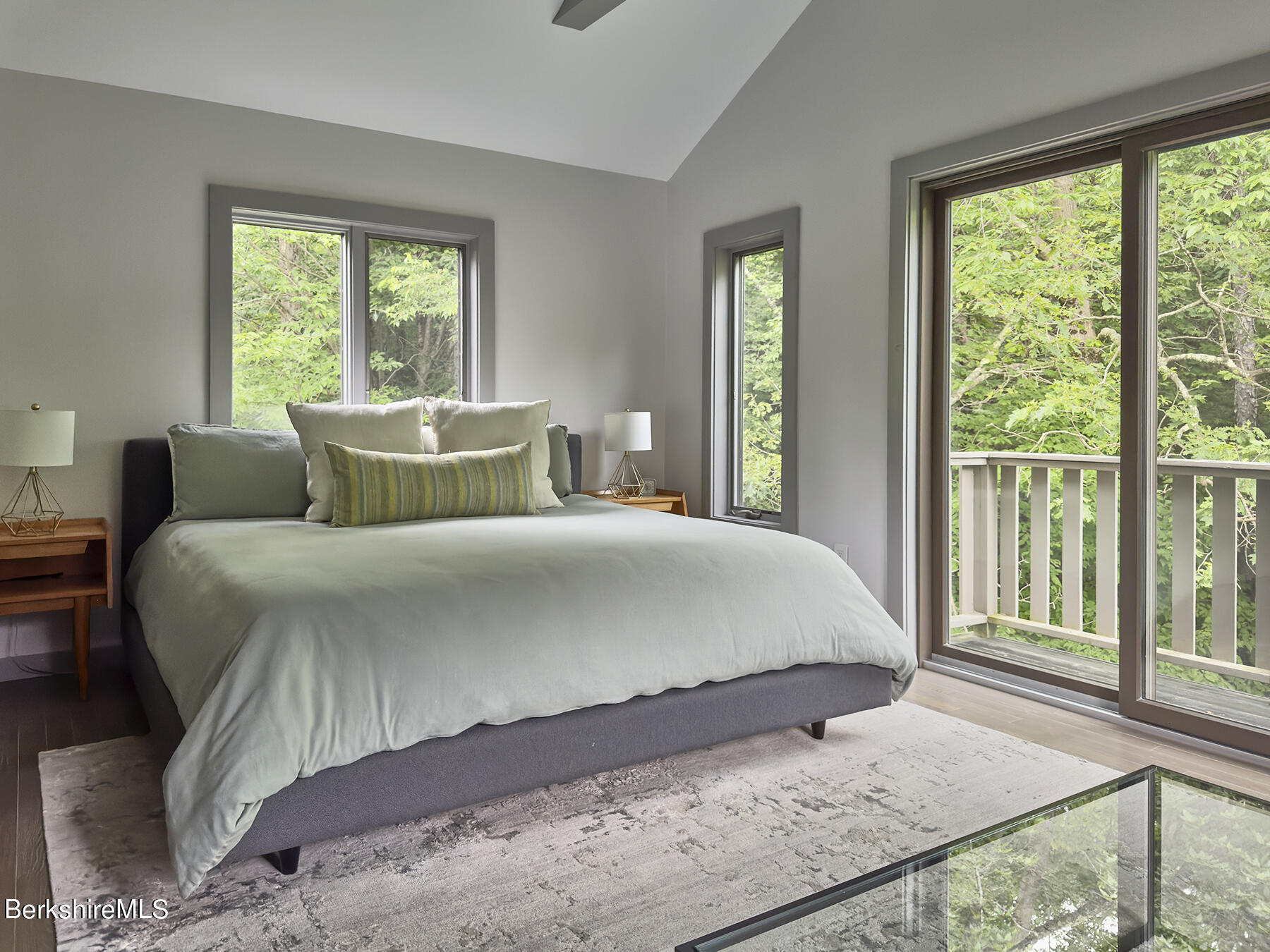 130 Woodmere Road Becket, MA 01223 - Photo 23 of 50 a bedroom with a large bed and a window