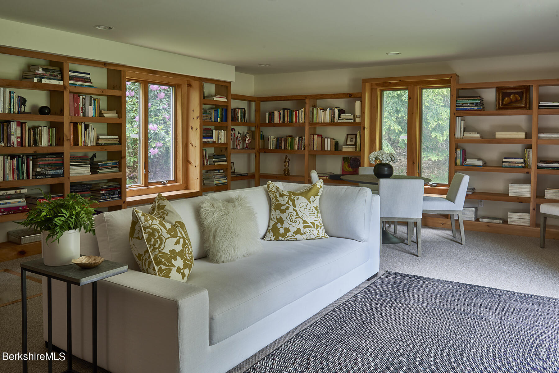 130 Woodmere Road Becket, MA 01223 - Photo 37 of 50 a living room with furniture and a large window