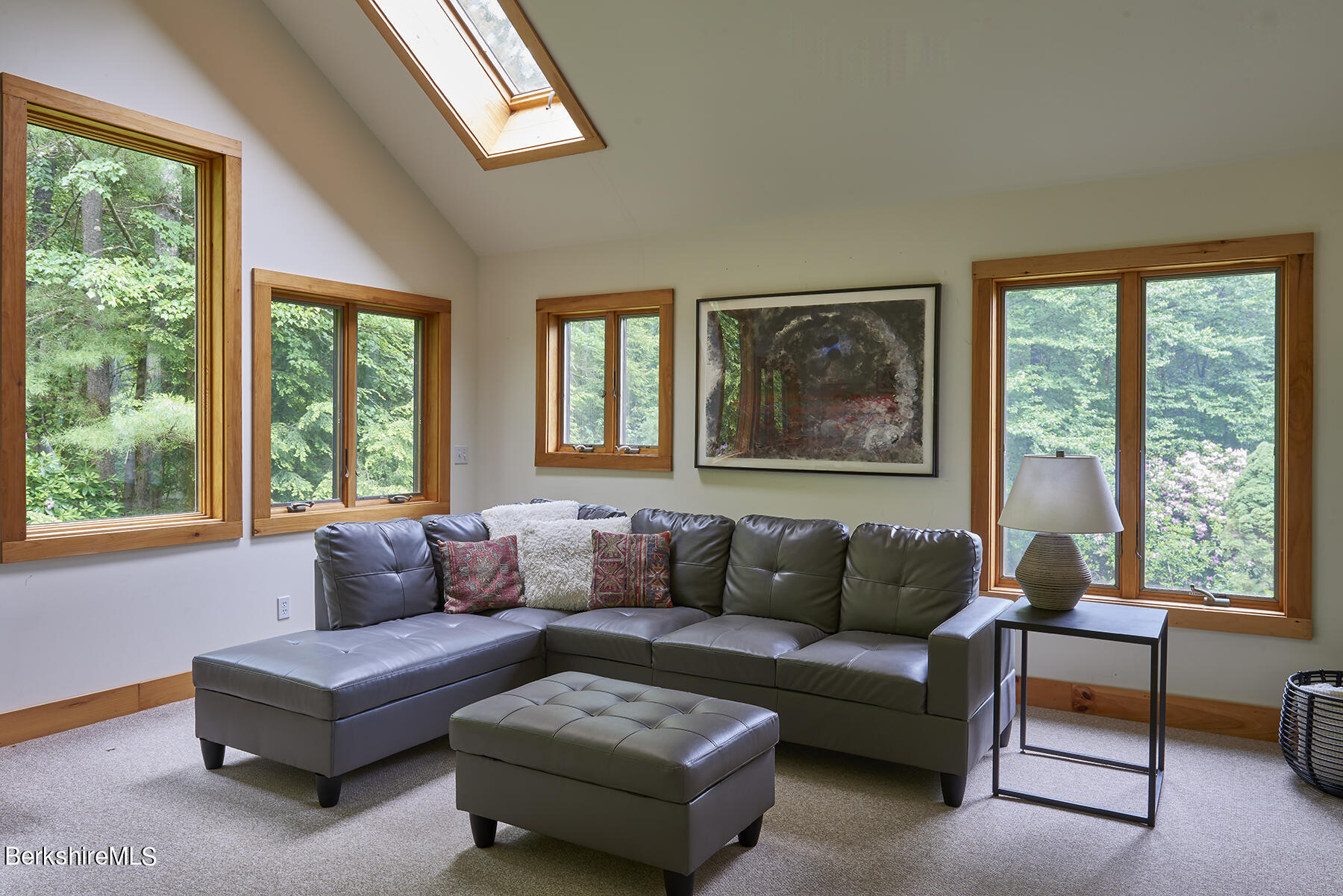 130 Woodmere Road Becket, MA 01223 - Photo 42 of 50 a living room with furniture and a large window