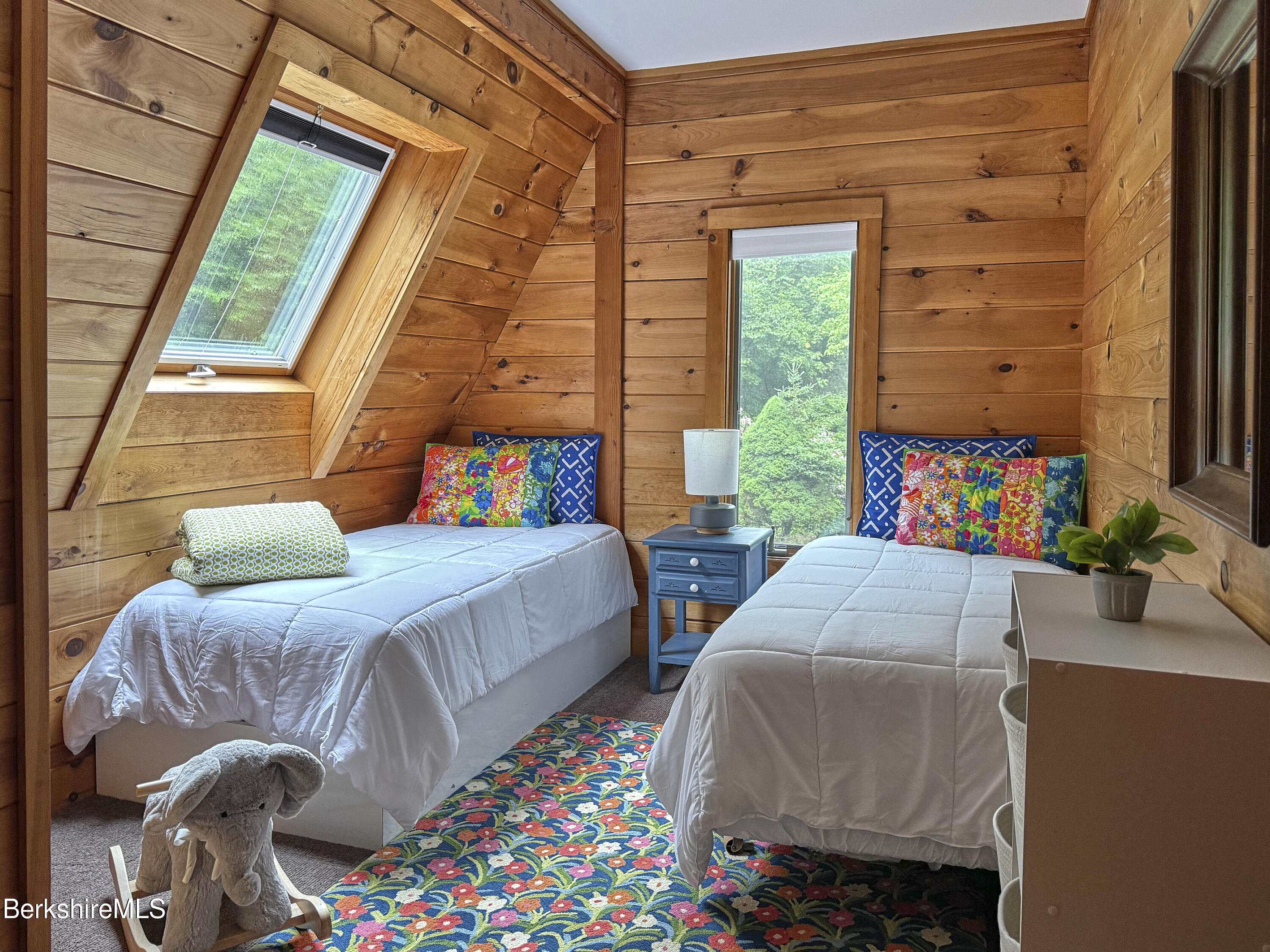 130 Woodmere Road Becket, MA 01223 - Photo 44 of 50 a bedroom with two beds and a large window
