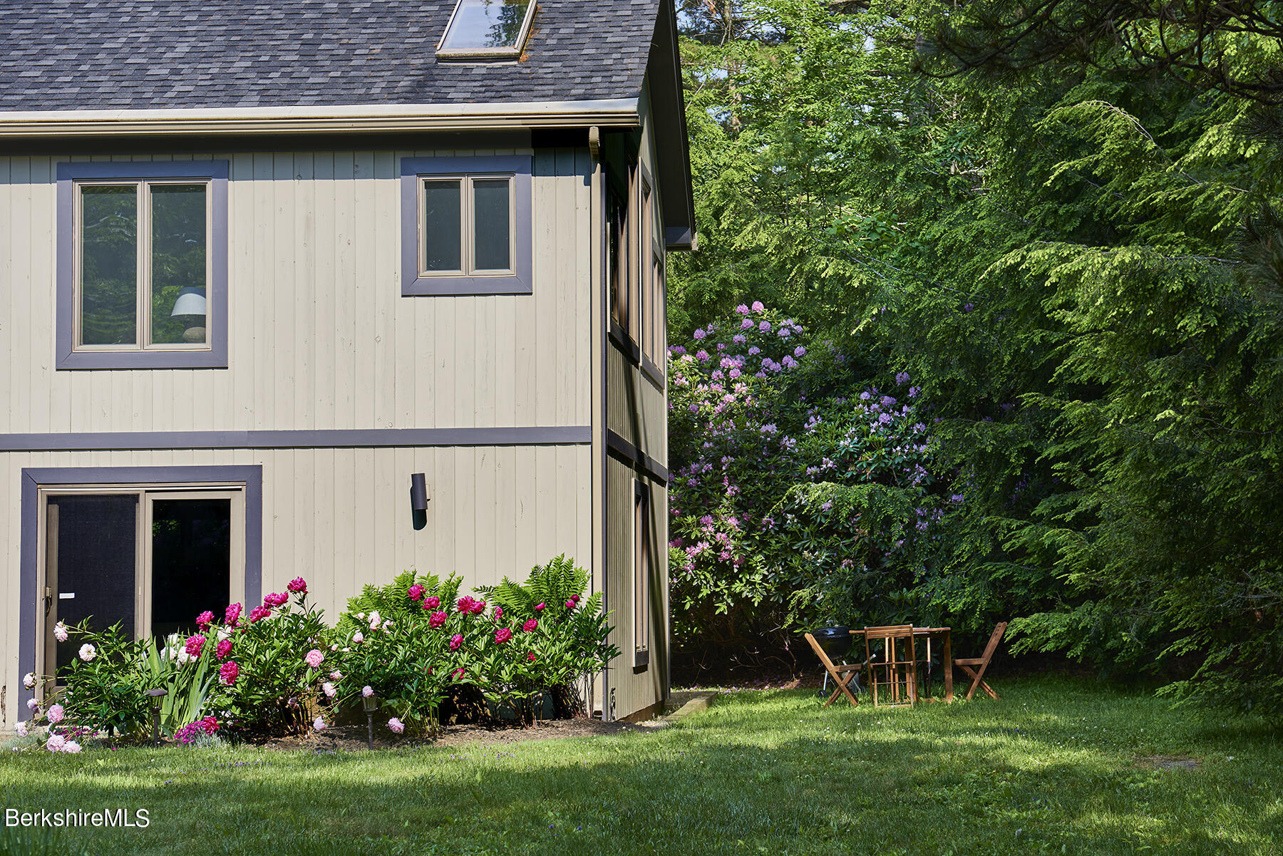130 Woodmere Road Becket, MA 01223 - Photo 47 of 50 front view of a house with a yard
