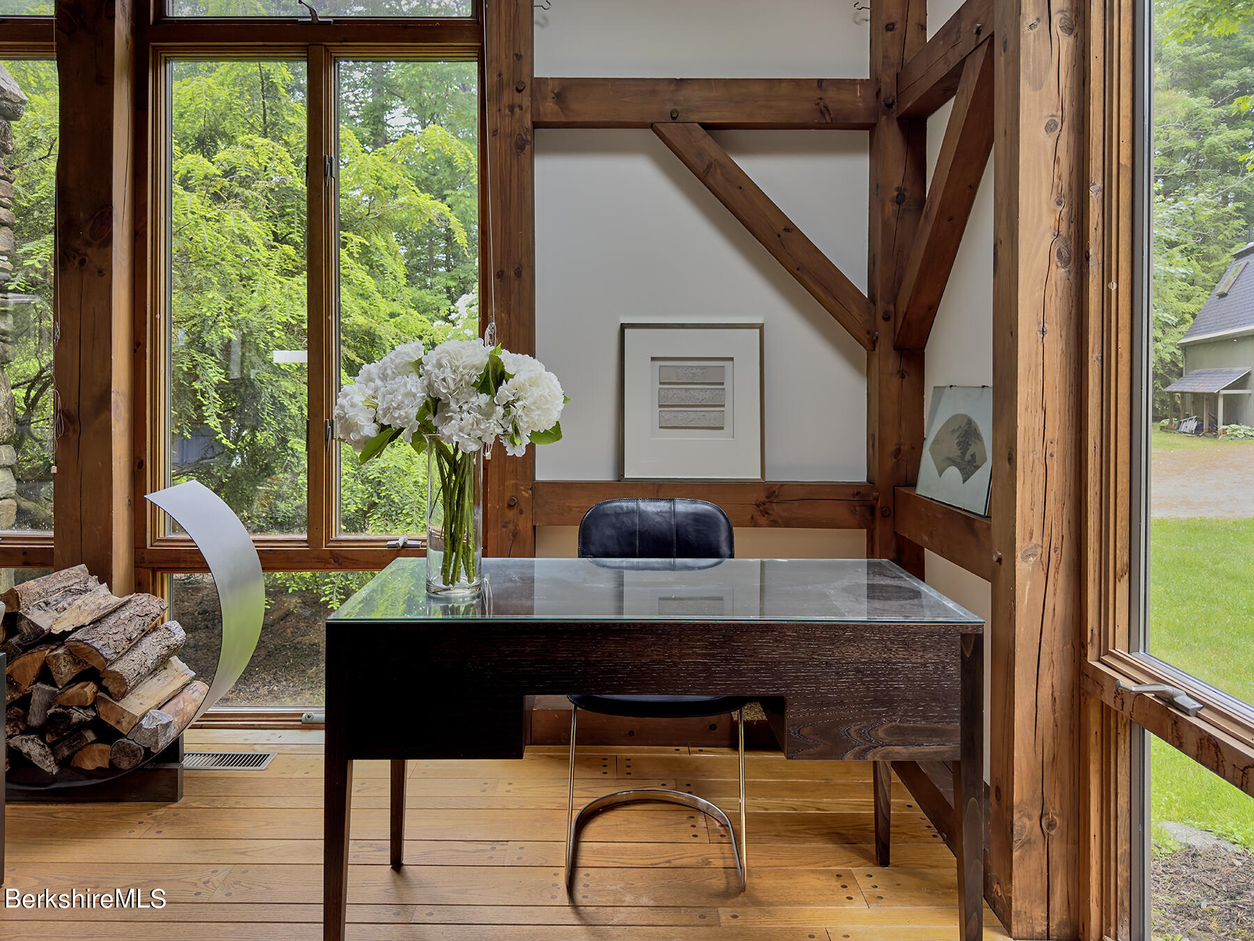 130 Woodmere Road Becket, MA 01223 - Photo 6 of 50 a view of a dining room with furniture and a window