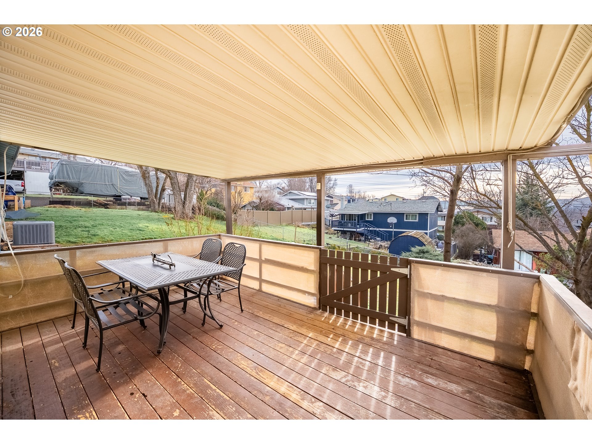 3312 Southwest Kirk Avenue Pendleton, OR 97801 - Photo 19 of 21 a balcony with wooden floor table and chairs
