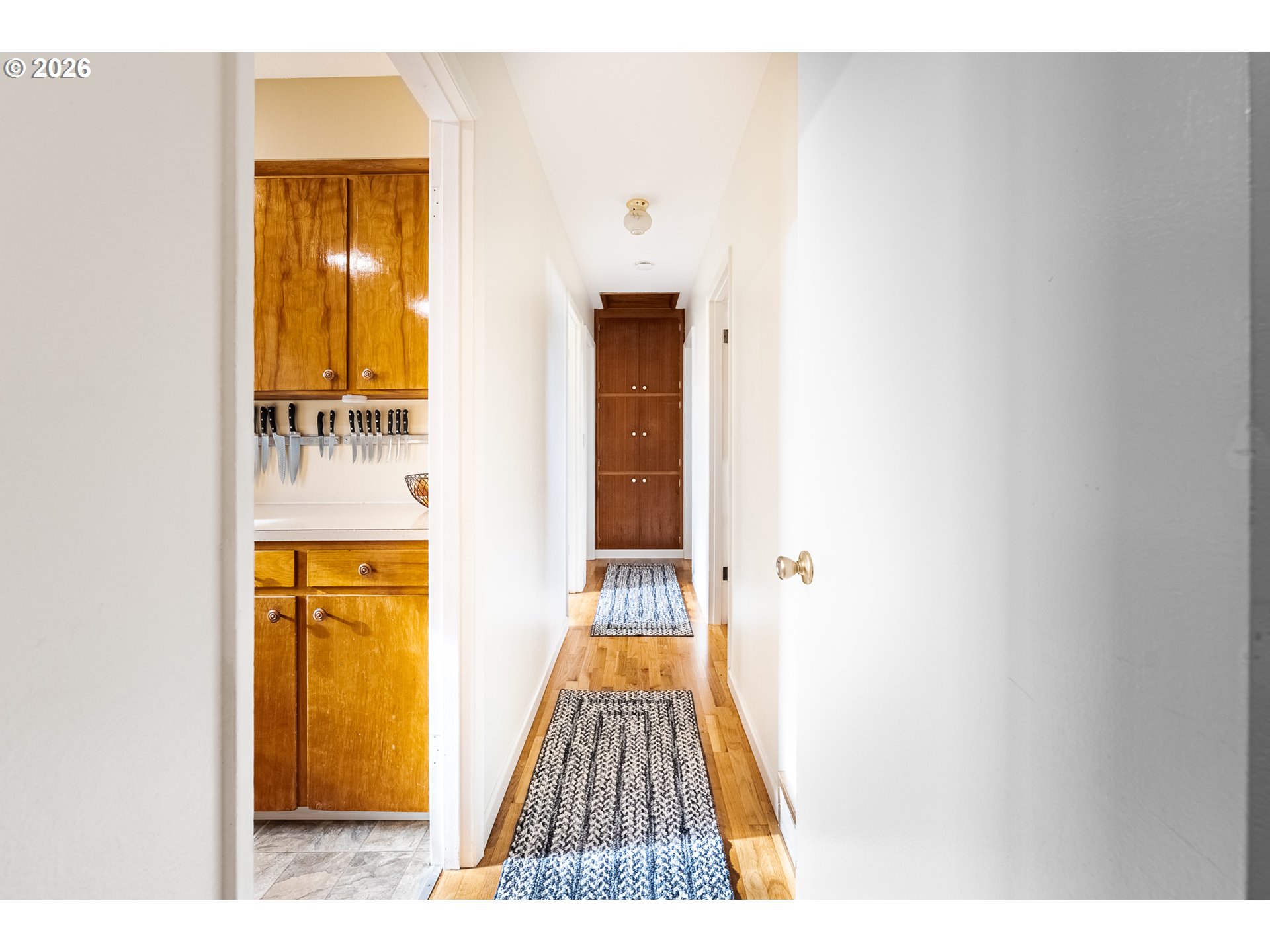 3312 Southwest Kirk Avenue Pendleton, OR 97801 - Photo 7 of 21 a view of a hallway with wooden floor
