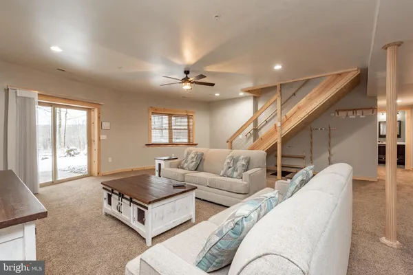 a living room with furniture and window