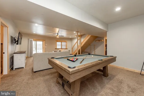 a bed room with a bed and dresser