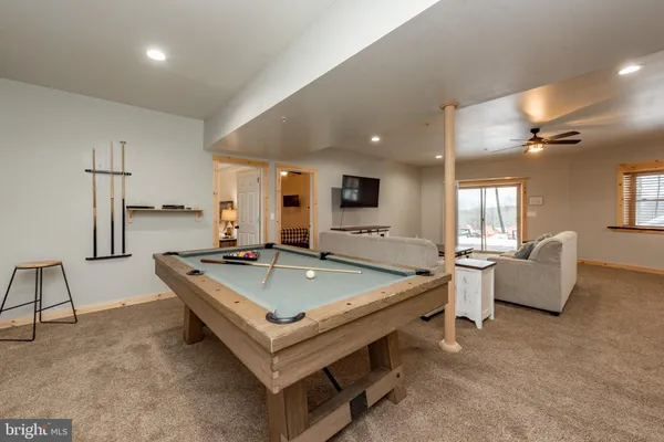 a bedroom with a bed and a night stand