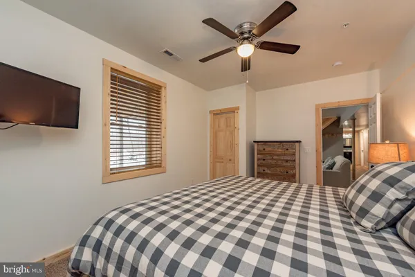 a view of balcony with furniture and garden