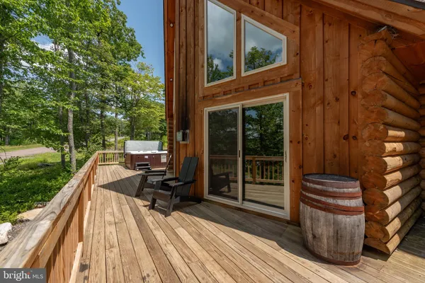 a view of barbeque area with seating area