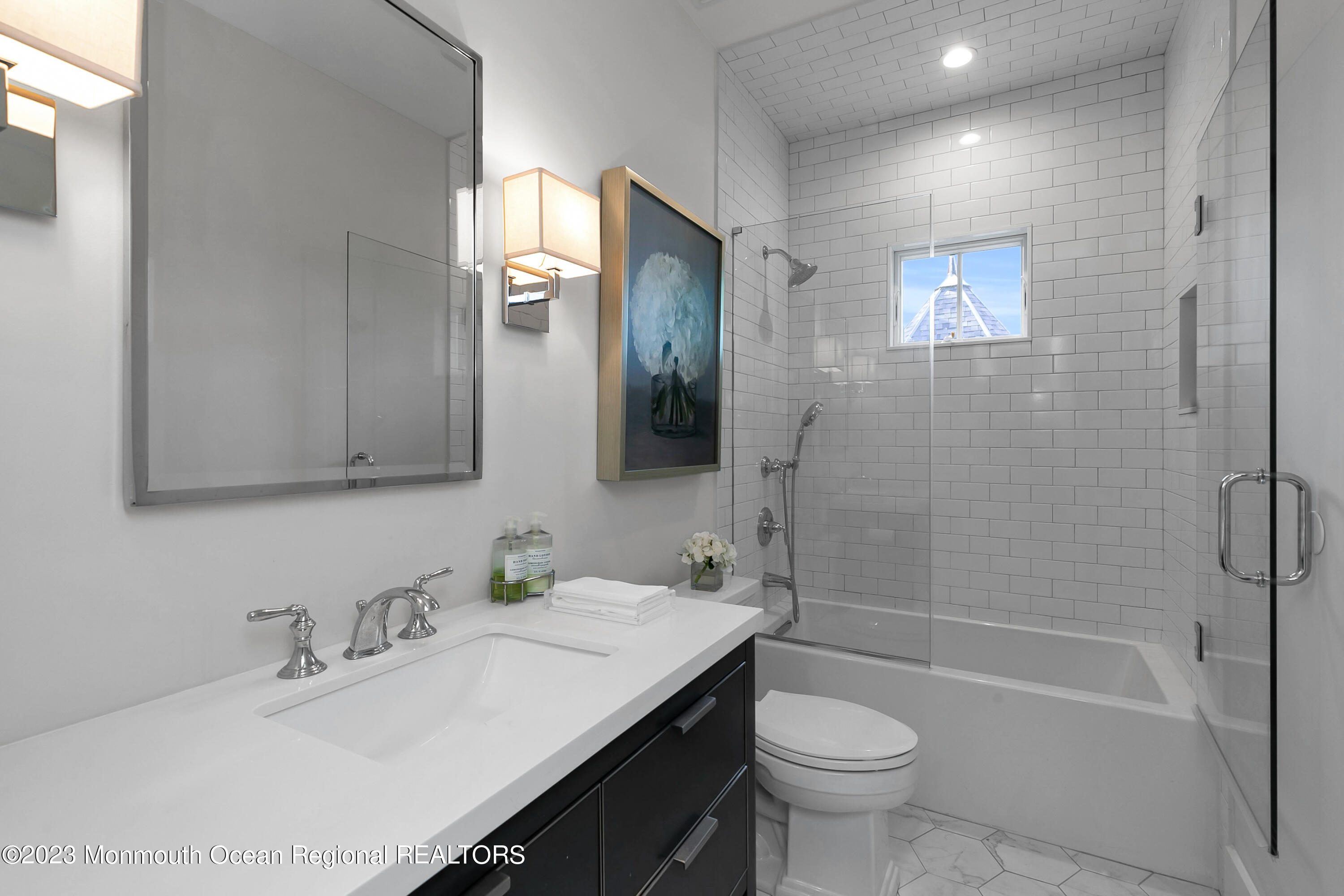 9 Allen Street Rumson, NJ 07760 - Photo 15 of 43 a bathroom with a sink a toilet and shower