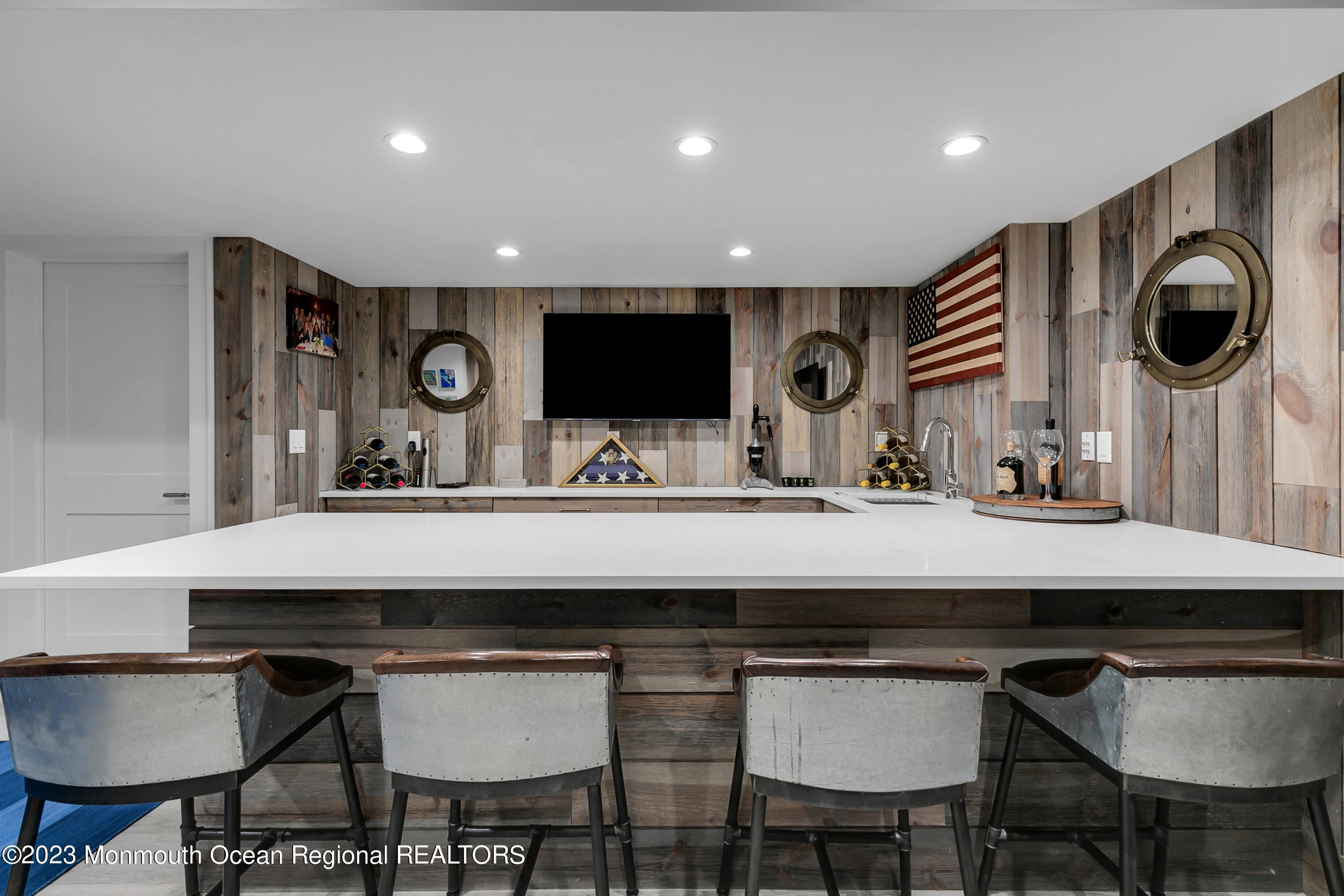 9 Allen Street Rumson, NJ 07760 - Photo 18 of 43 a kitchen with a table and chairs in it
