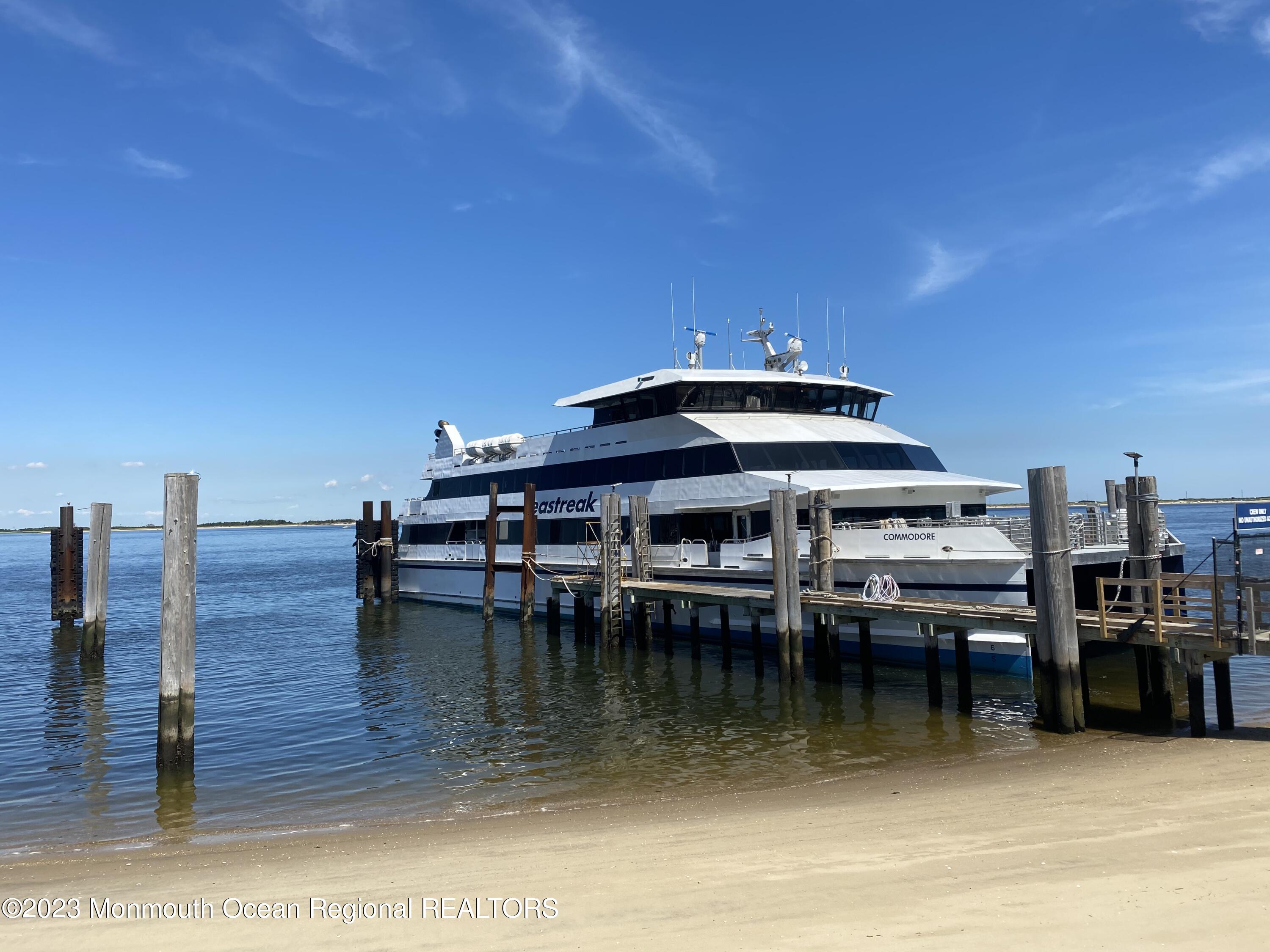 9 Allen Street Rumson, NJ 07760 - Photo 43 of 43 a view of a swimming pool with outdoor seating