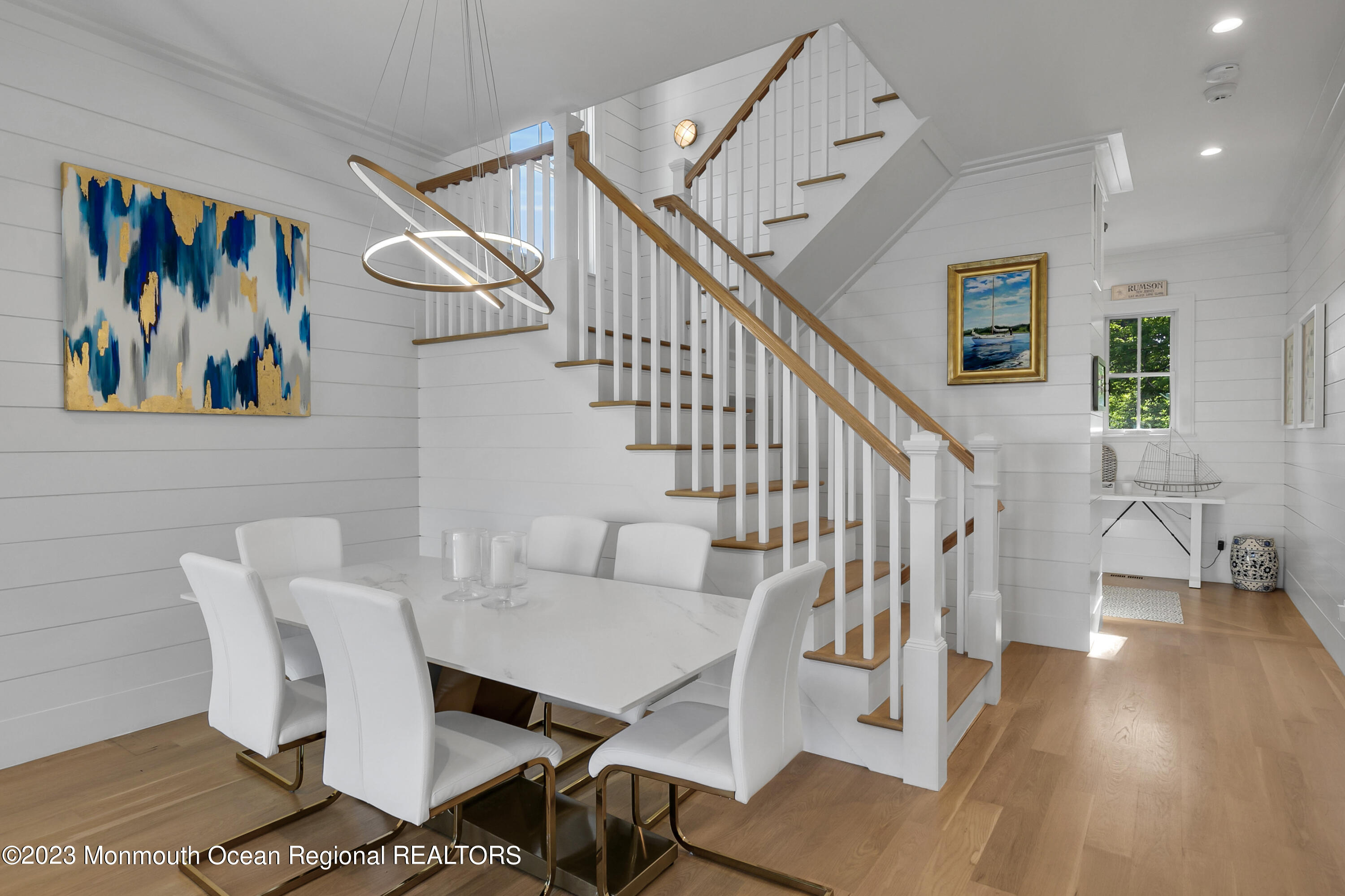9 Allen Street Rumson, NJ 07760 - Photo 8 of 43 a view of a dining room with furniture wooden floor and a rug