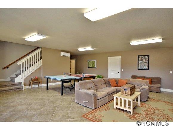 340 Porters Ridge Canton, NC 28716 - Photo 20 of 22 a living room with furniture and a wooden floor