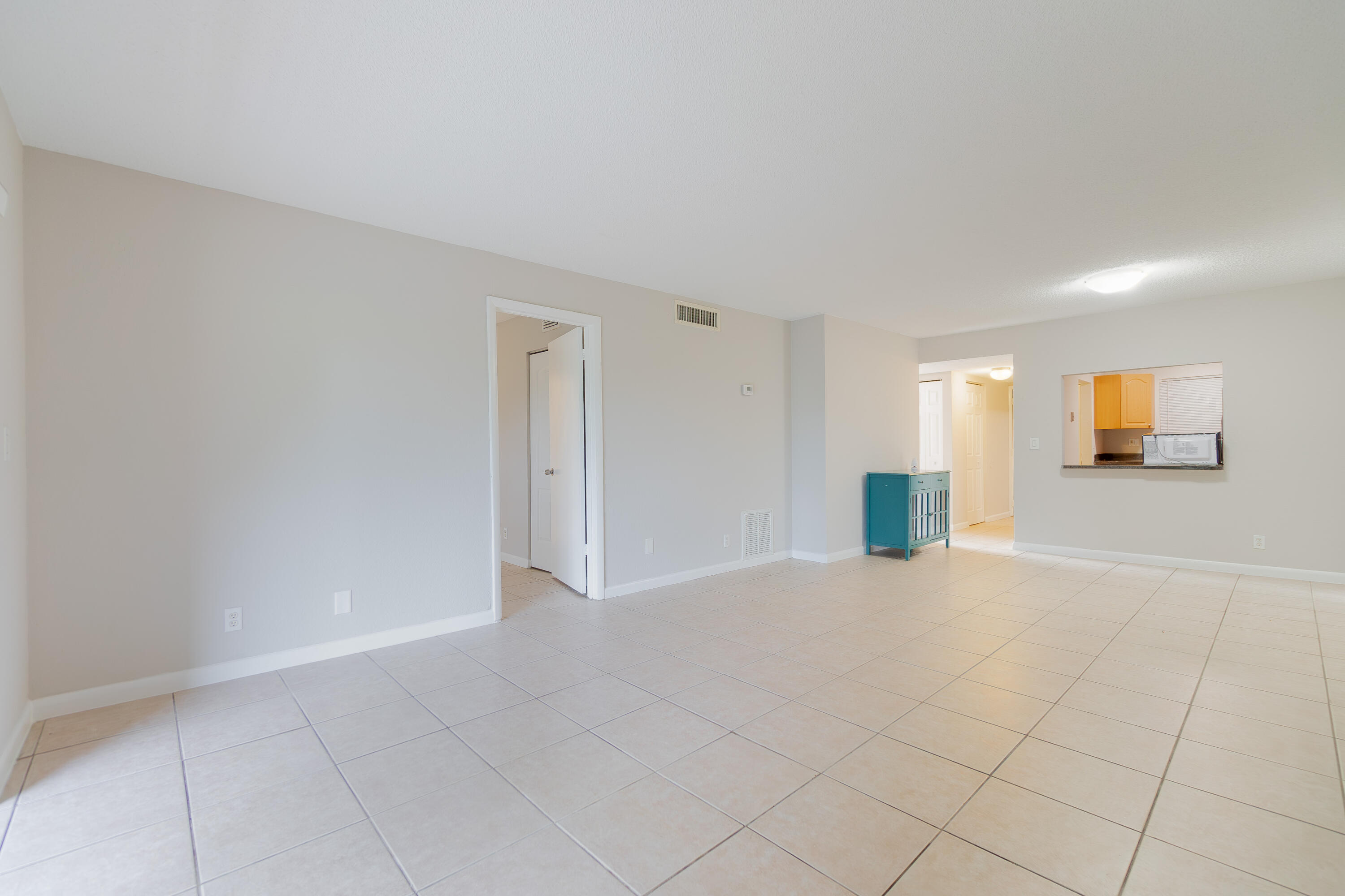 120 Sparrow Drive, Unit 314 Royal Palm Beach, FL 33411 - Photo 11 of 17 a view of an empty room and window