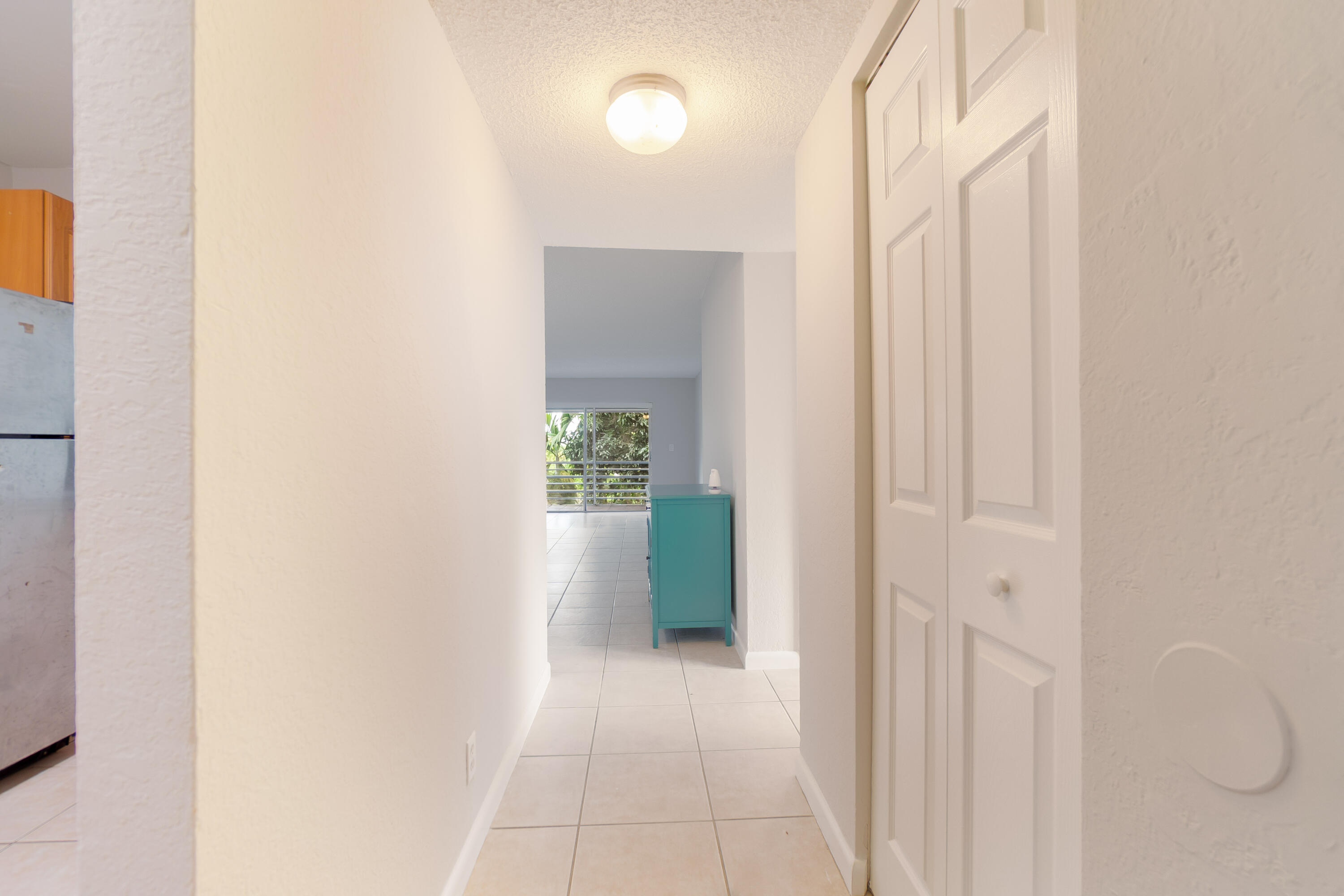 120 Sparrow Drive, Unit 314 Royal Palm Beach, FL 33411 - Photo 2 of 17 a view of a hallway