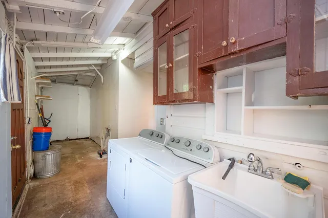 a bathroom with a tub and shower