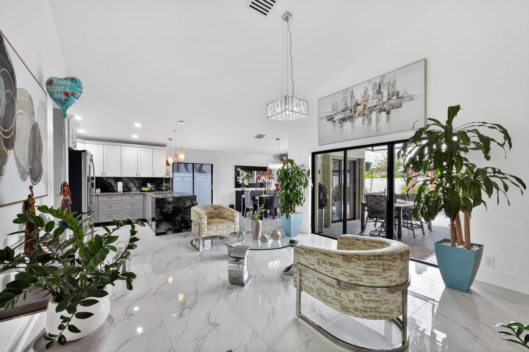 11423 Whisper Sound Drive Boca Raton, FL 33428 - Photo 13 of 39 10_11423_Whisper_Sound_Dr-Living_room-00