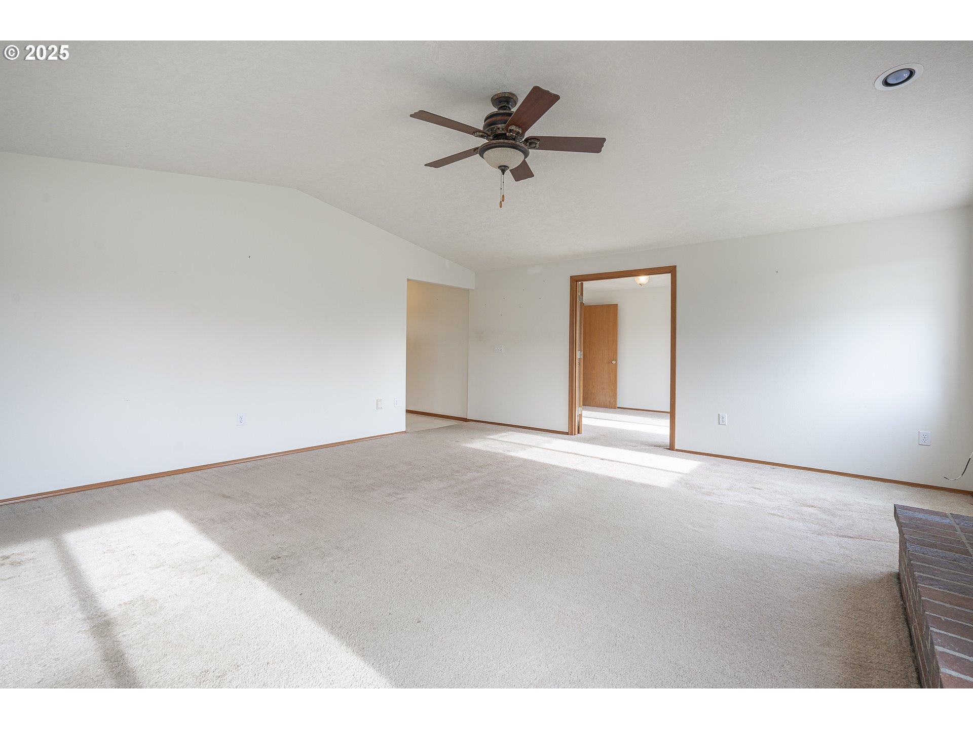 7295 Northwest Poverty Bend Road McMinnville, OR 97128 - Photo 15 of 44 a view of a livingroom with a ceiling fan and window