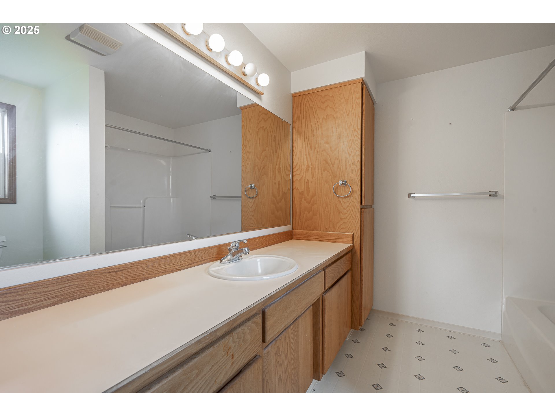 7295 Northwest Poverty Bend Road McMinnville, OR 97128 - Photo 24 of 44 a bathroom with a sink and a mirror