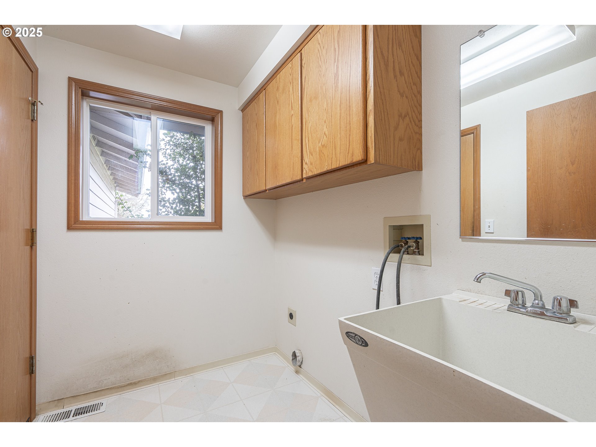 7295 Northwest Poverty Bend Road McMinnville, OR 97128 - Photo 25 of 44 a bathroom with a sink and a mirror