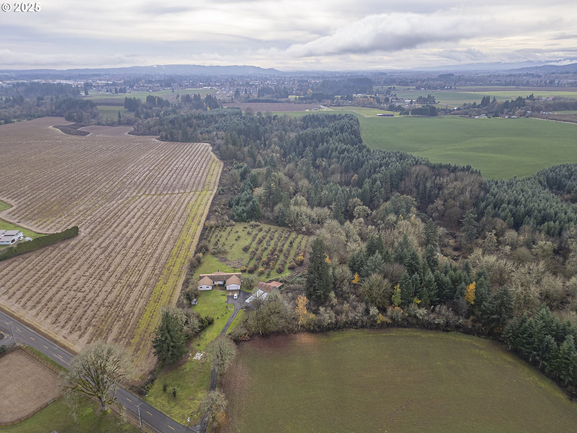 7295 Northwest Poverty Bend Road McMinnville, OR 97128 - Photo 34 of 44 an aerial view of a house with a lake view