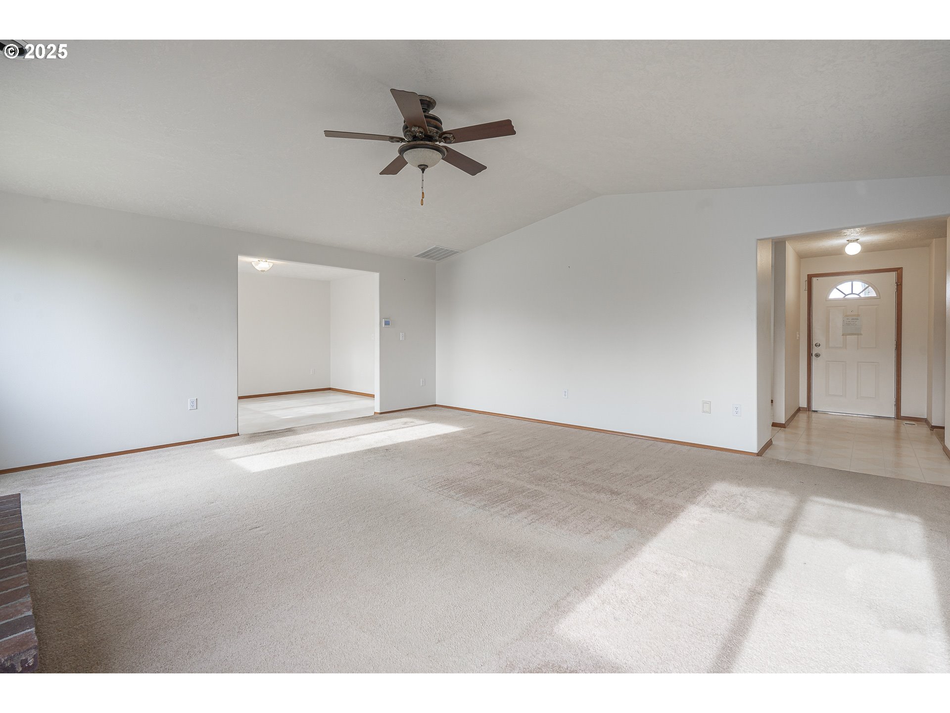 7295 Northwest Poverty Bend Road McMinnville, OR 97128 - Photo 10 of 44 a view of an empty room and chandelier fan