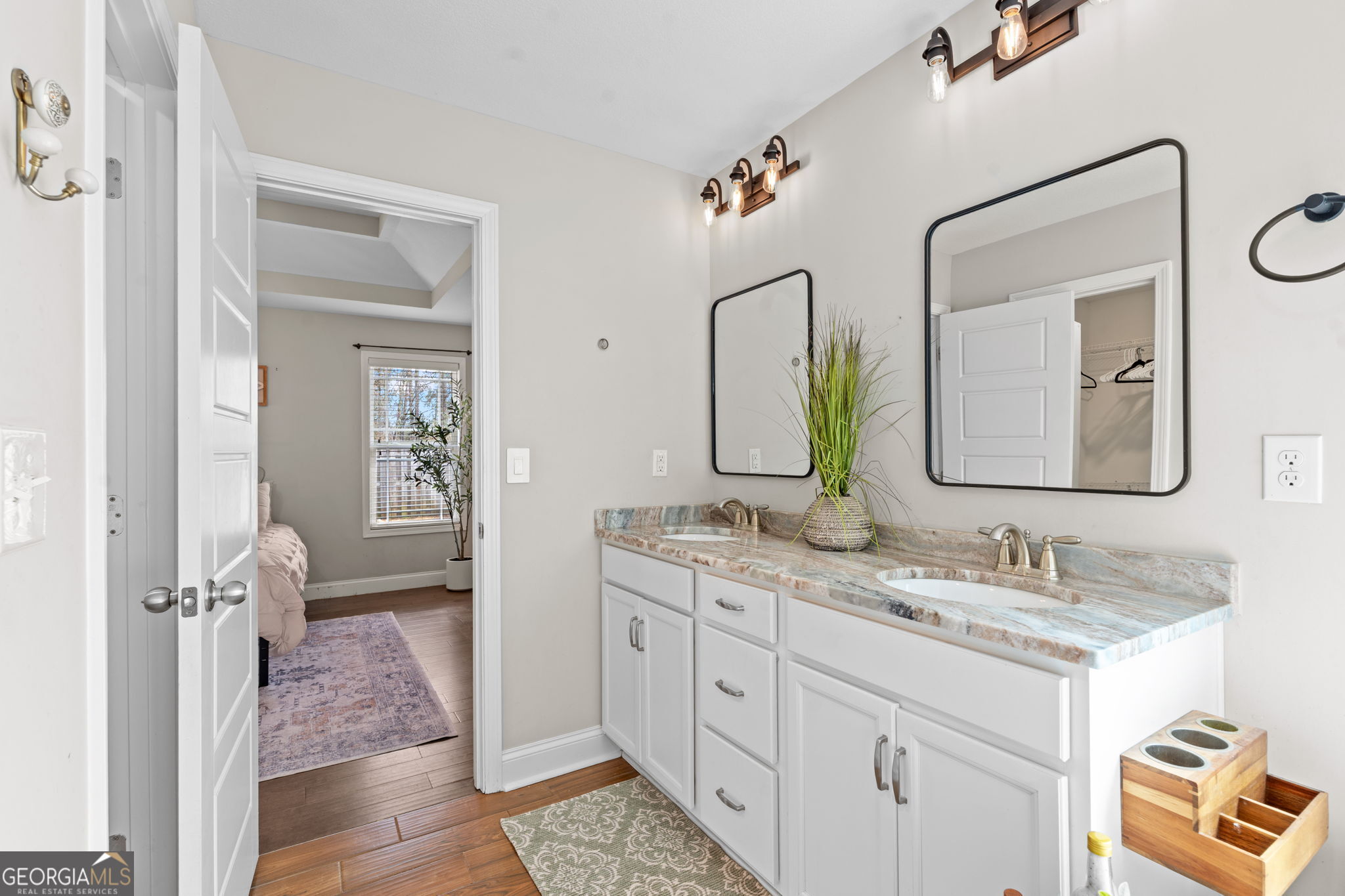171 Hawks Rdg Trace Byron, GA 31008 - Photo 21 of 34 a en suite bathroom with a granite countertop sink and a mirror