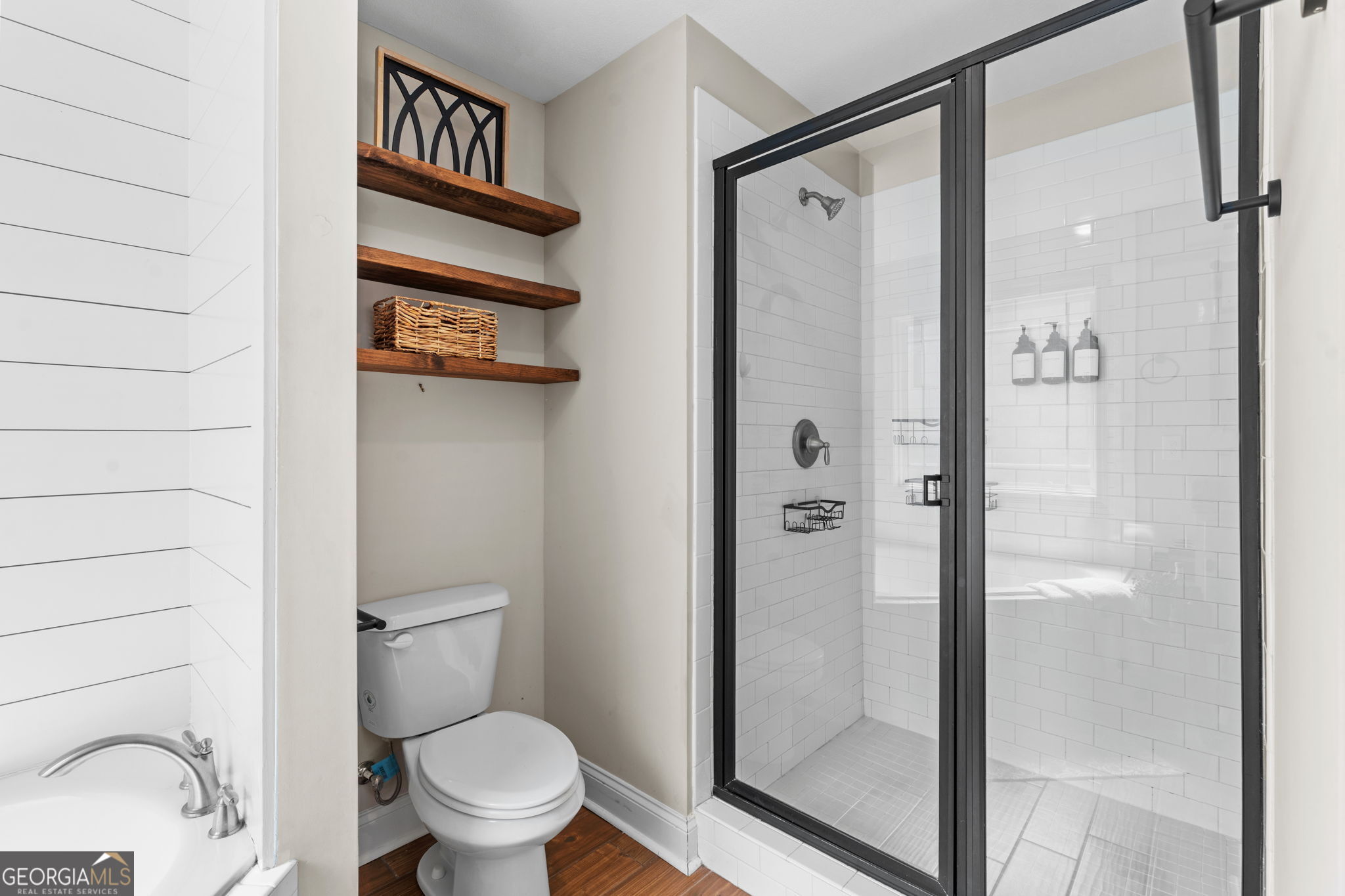 171 Hawks Rdg Trace Byron, GA 31008 - Photo 22 of 34 a bathroom with a toilet and a shower