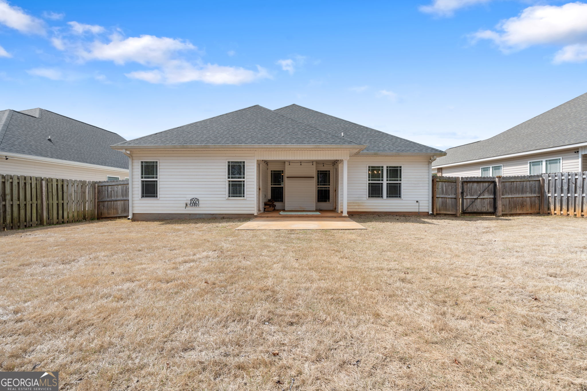 171 Hawks Rdg Trace Byron, GA 31008 - Photo 32 of 34 a view of a house with a yard