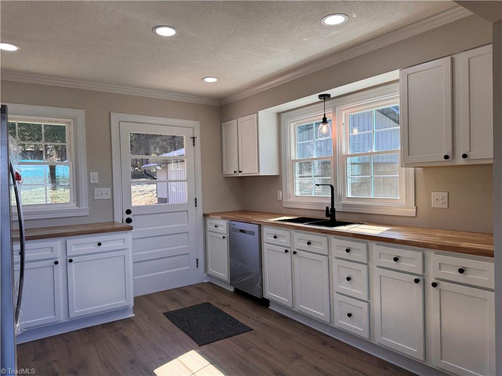 2082 Hedrick Mill Road Lexington, NC 27292 - Photo 4 of 24 Lovely open kitchen with lots of natural light. Butcher block countertops, SS brand new appliances