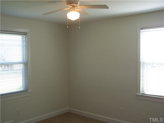 108 Lord Berkley Road Raleigh, NC 27610 - Photo 16 of 24 an empty room with a window