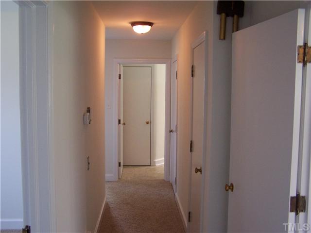 108 Lord Berkley Road Raleigh, NC 27610 - Photo 17 of 24 a view of a hallway with closet area
