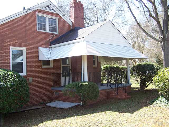 108 Lord Berkley Road Raleigh, NC 27610 - Photo 3 of 24 a front view of a house with garden