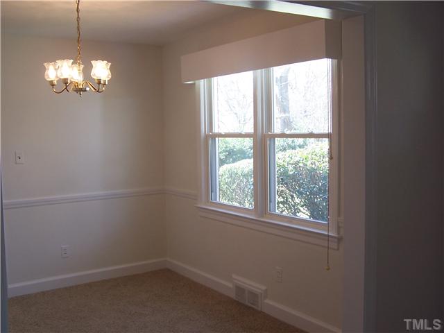 108 Lord Berkley Road Raleigh, NC 27610 - Photo 8 of 24 an empty room with a window