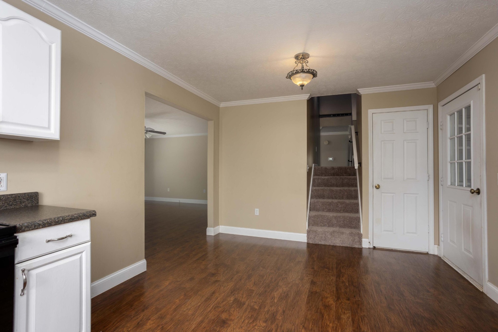 1165 Possum Trot Road Grandview, TN 37337 - Photo 17 of 48 wooden floor in an empty room with a window