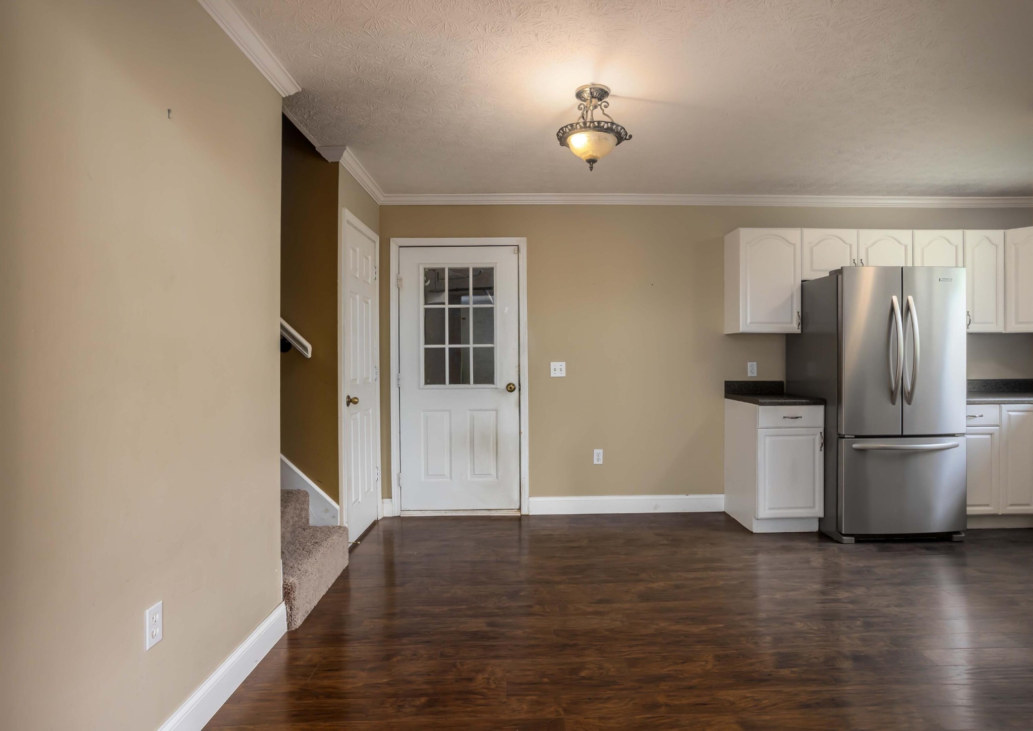 1165 Possum Trot Road Grandview, TN 37337 - Photo 18 of 48 a view of a kitchen with a sink and a refrigerator