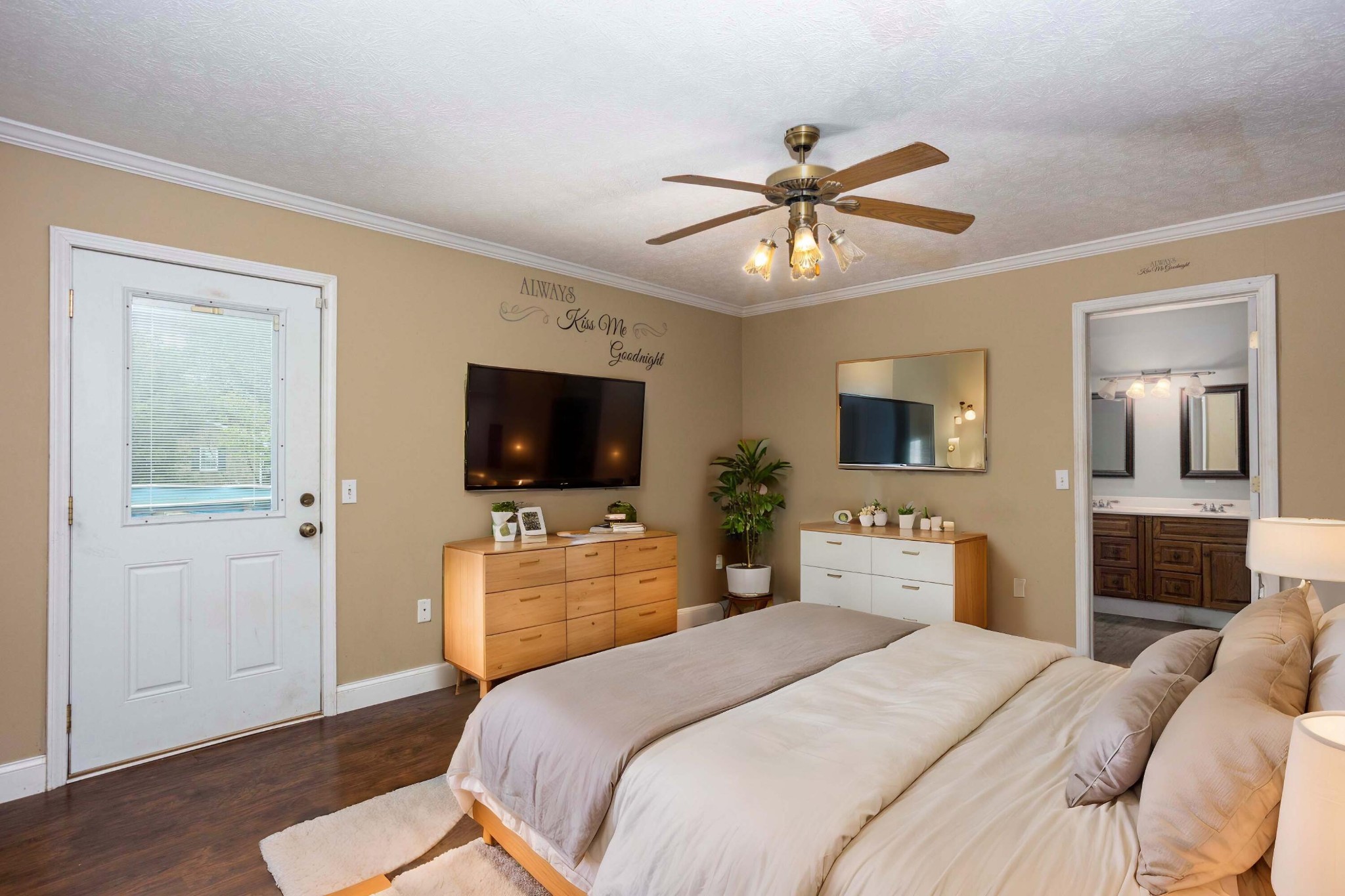 1165 Possum Trot Road Grandview, TN 37337 - Photo 20 of 48 a bedroom with a bed and a flat screen tv